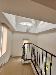 Second floor landing with natural light from skylight luxury house Tucan Panama
