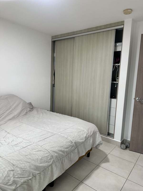 Spacious bedroom with sliding closet doors and balcony in El Mare 700 Edison Park Panama