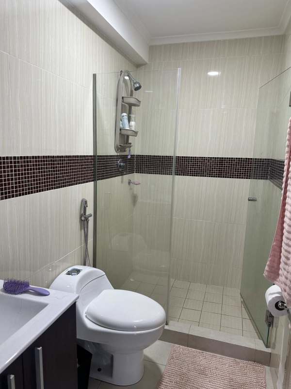 Contemporary bathroom with glass shower, mosaic accent tiles at PH El Mare 700 Panama City