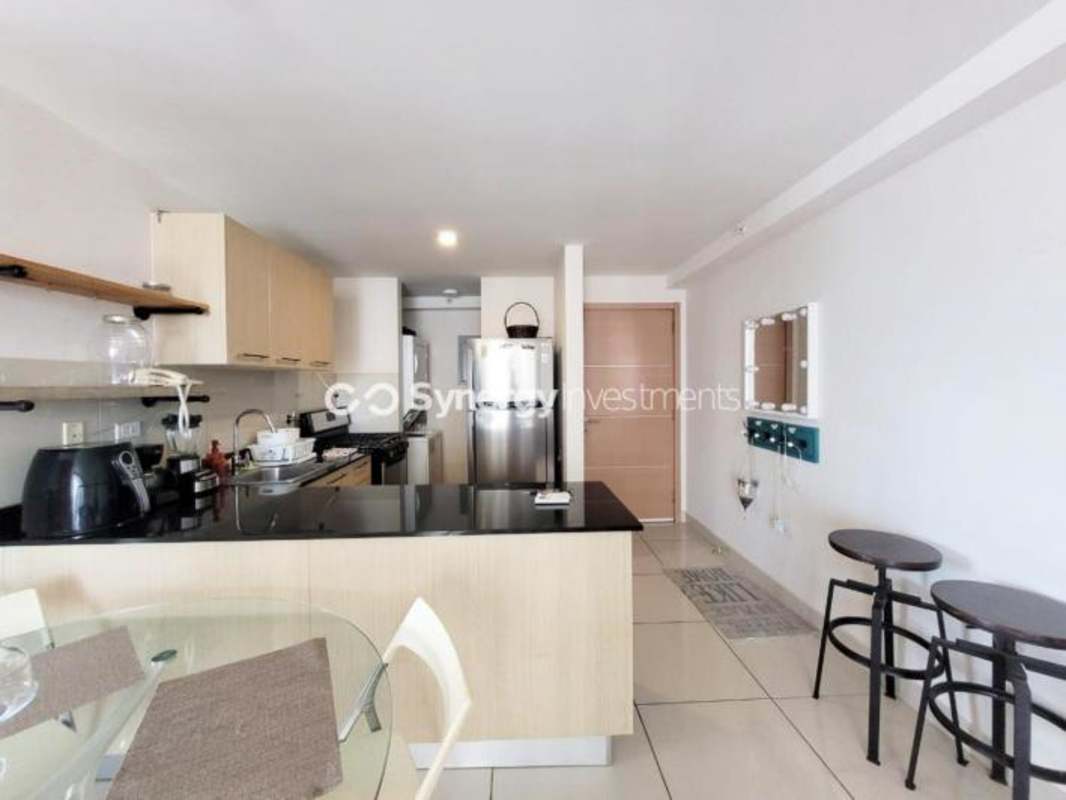 Master bedroom with AC, city view window, and closet at PH Carrasquilla Panama