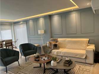 Contemporary kitchen with breakfast bar and stainless appliances in Palmia Woodlands Panama