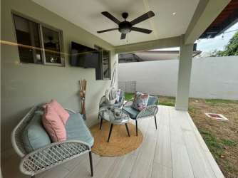 Shared outdoor swimming pool and recreation area at Palmia Woodlands Panama