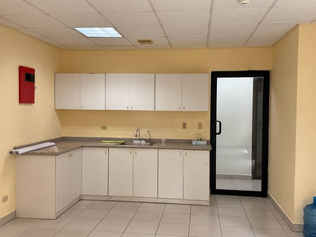 Renovated bathroom with glass shower and tile in Vista Hermosa Panama commercial property