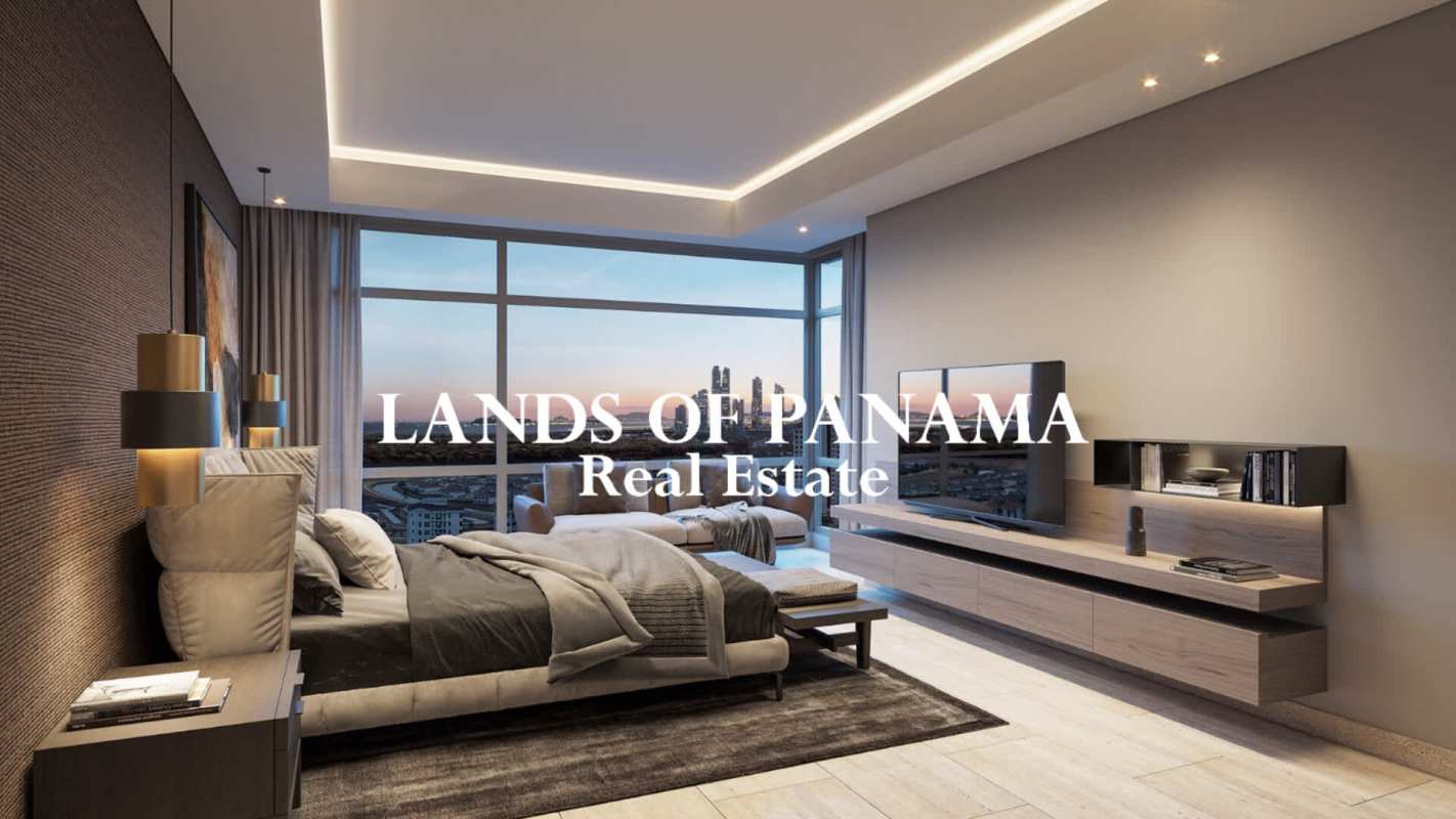 Spacious modern bedroom with skyline view, floor-to-ceiling windows in Guayacán Tower Panama