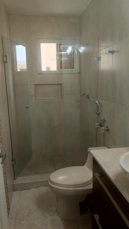 Furnished bedroom featuring split AC, large window, city view in El Cangrejo apartment Panama