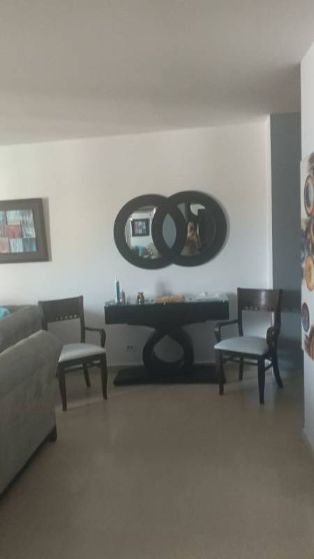 Bedroom with split AC, closet and marble flooring in El Cangrejo apartment Panama