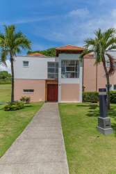 Spacious living dining area with large windows at Villa Decameron Rio Hato Panama