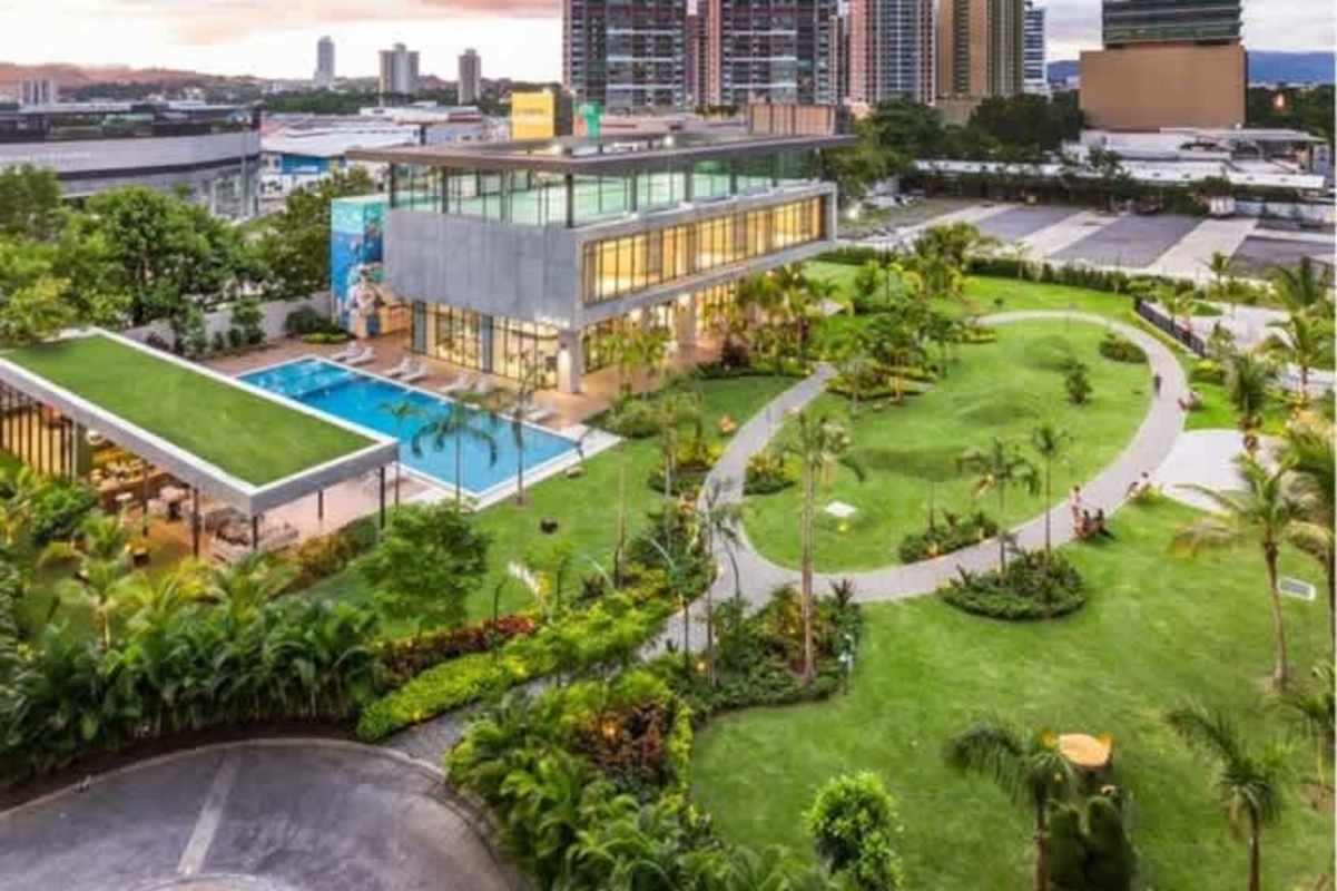 Bright living room with large windows furnished apartment Costa del Este Country Club Panama