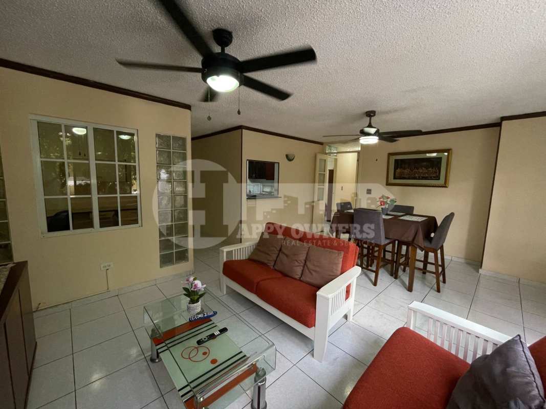 Swimming pool with decorative bridge, sun deck at PH Del Caribe in El Cangrejo Panama