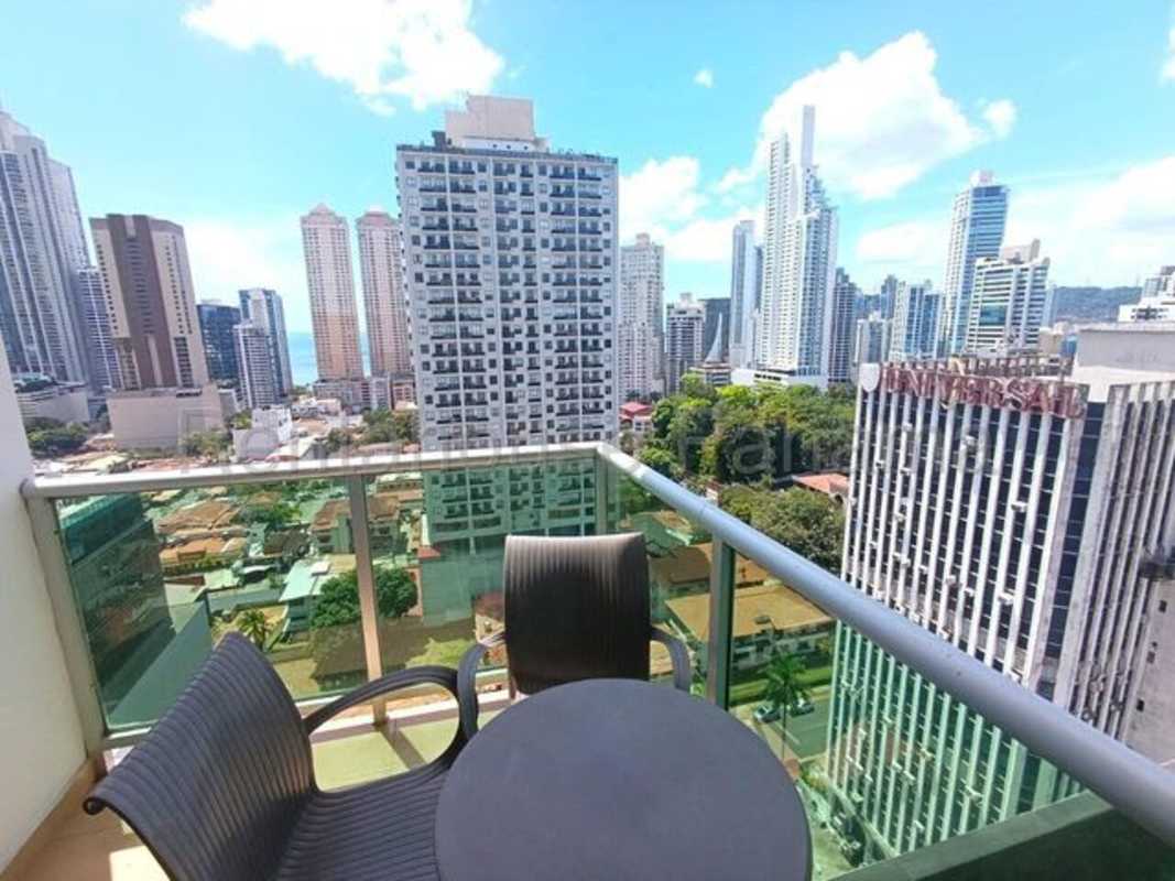 Open living dining space with tile flooring and city views in PH The Seawaves Bella Vista Panama