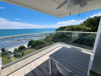 Balcony with lounge seating overlooking ocean El Palmar at The Palms