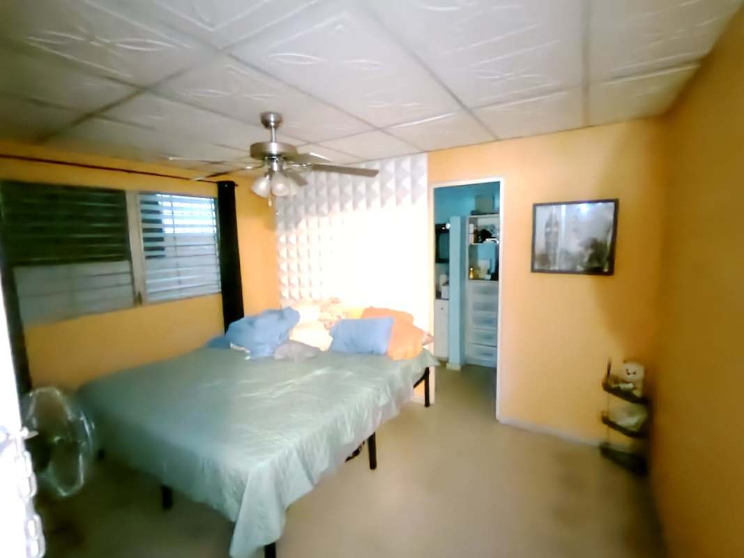 Dining space with glass table in residential house for sale Chanis Panama