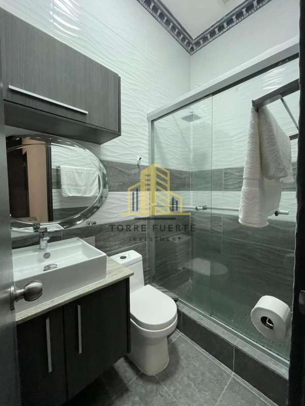 Modern bathroom with glass enclosure in private house Altos de Panamá