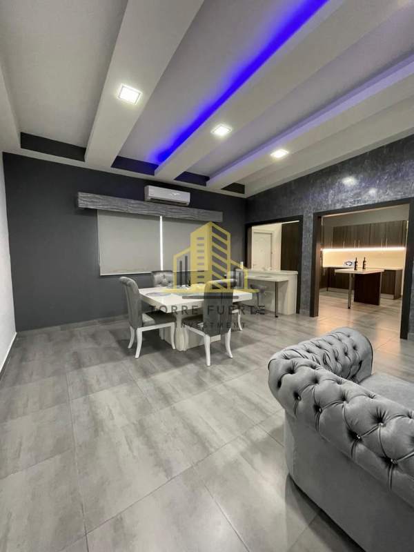 Contemporary dining room with tray ceiling and LED lights in house rental Altos de Panamá