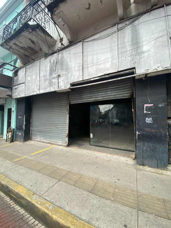 Street corner commercial retail with metal shutters UNESCO Casco Viejo Panama