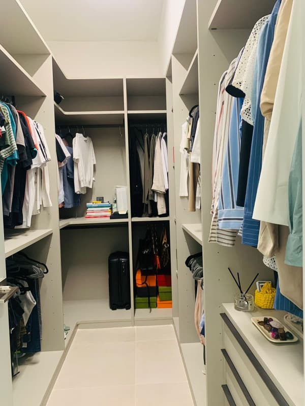 Master bedroom suite with walk-in closet and private balcony luxury townhouse The Reserve Panama City