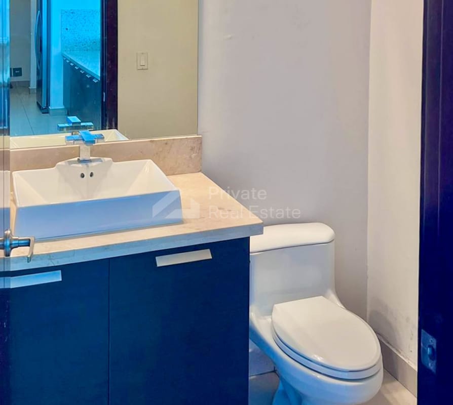 Sleek bathroom with vessel sink, large mirror, modern design in PH Oceanaire Punta Pacifica Panorama