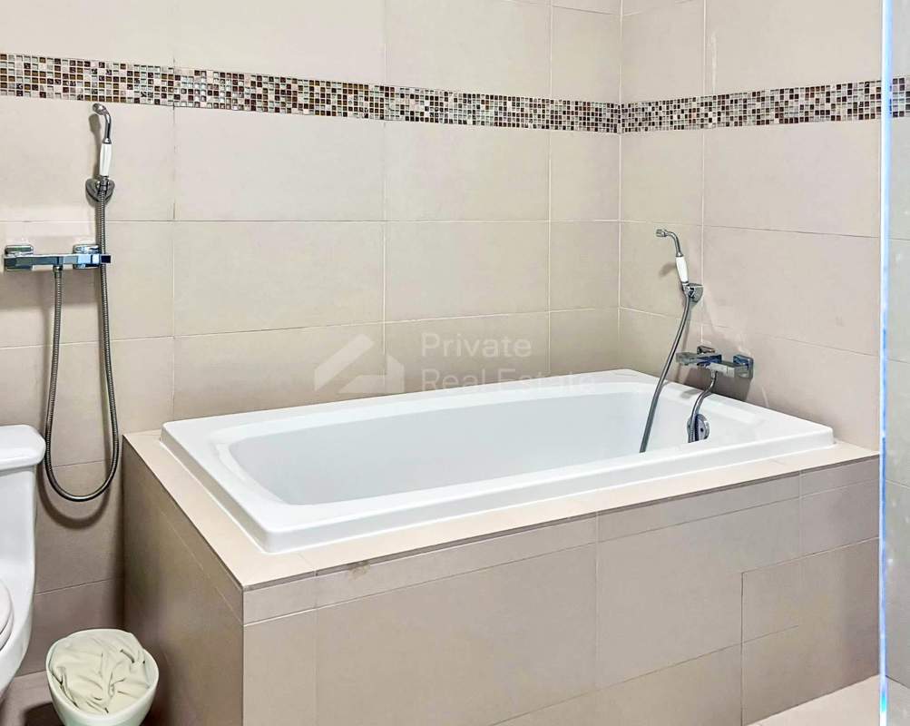 Bathroom featuring built-in bathtub with mosaic tile detail PH Oceanaire Punta Pacifica