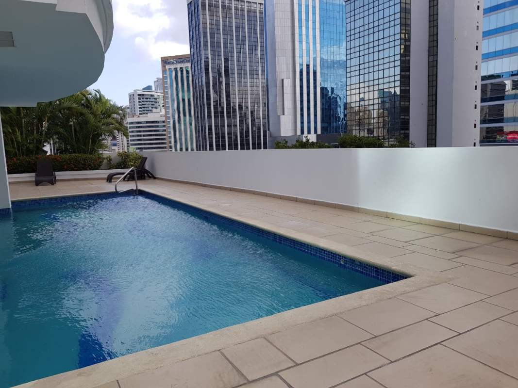 Rooftop swimming pool city skyline PH Galeria Uno Panama condo for sale