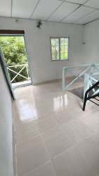 Small hall with balcony access overlooking garden in Las Guias cabin Panama