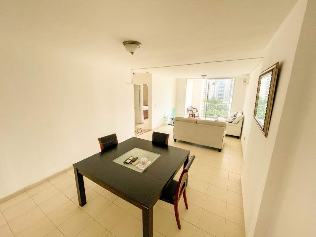 Open-plan living dining room, large windows, balcony view at PH Quattro Panama City