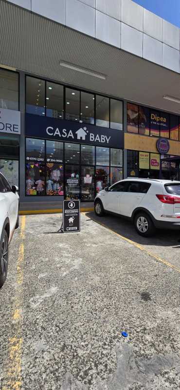 Glass storefront exterior of Casa Baby children's boutique at Plaza 74 San Francisco Panama