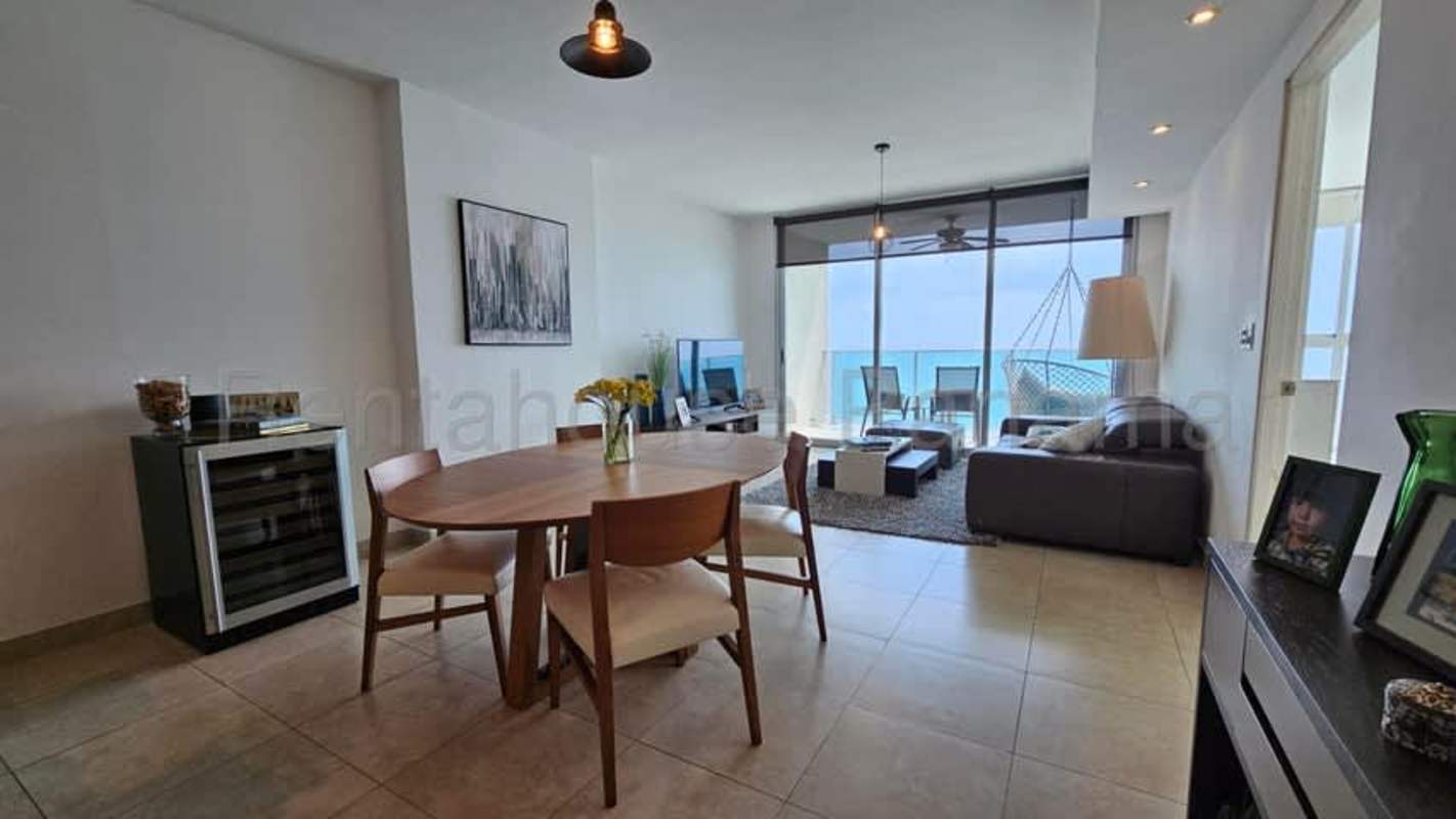 Stylish kitchen with granite countertops, black cabinetry, modern appliances in PH H2O Panama