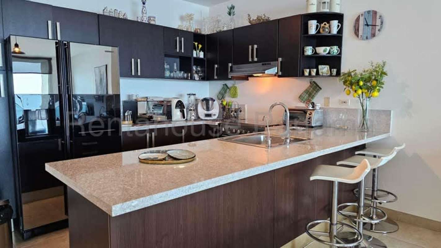 Bedroom featuring large windows with ocean view, walk-in closet in PH H2O on Avenida Balboa