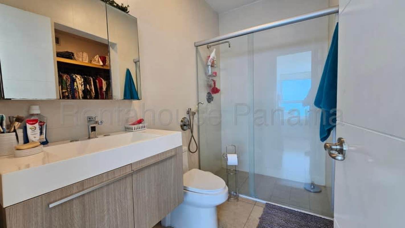 Modern open living dining area with oceanfront balcony in PH H2O on Avenida Balboa Panama City