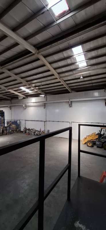 Industrial warehouse interior with skylights, concrete floors and wide storage space in Pacora Panama