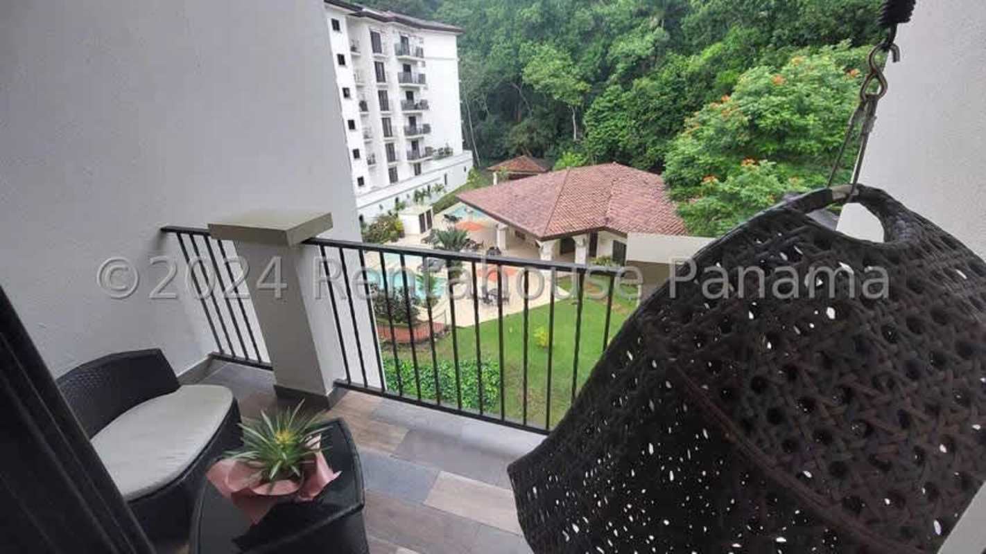 Outdoor swimming pools at Embassy Village Albrook Panama lush surroundings