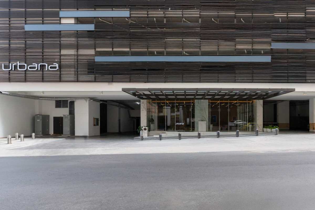 Modern glass facade of PH Urbana building in Obarrio Panama City