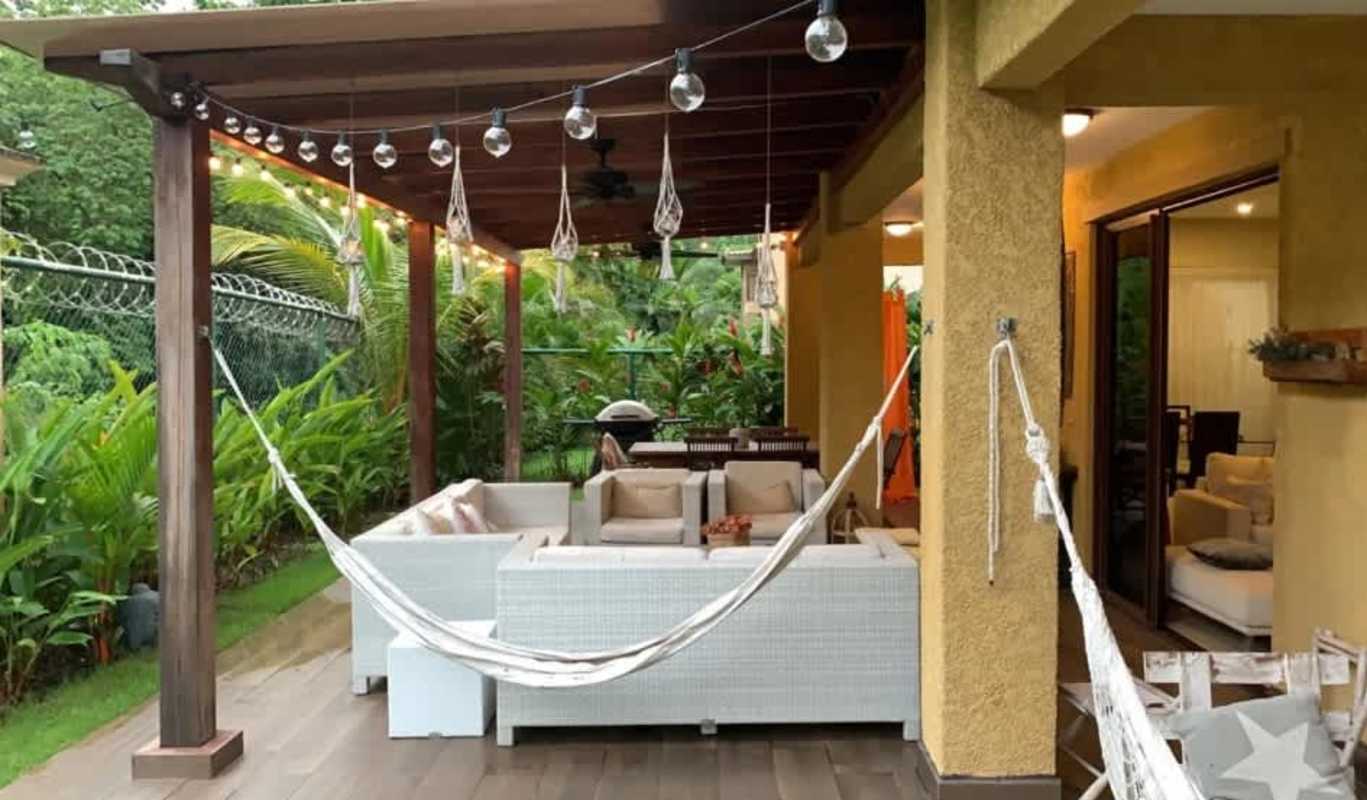 Bright open-plan living area with terrace access Embassy Club Clayton