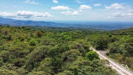 Expansive view of valleys and mountain ranges from land in Alto Jaramillo Boquete