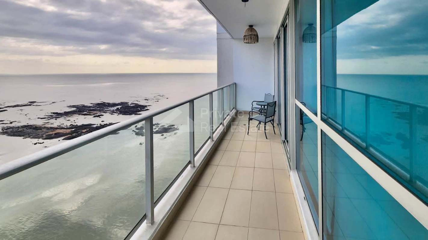 Spacious walk-in closet leading to bedroom with city views in PH Oceania Punta Pacifica Panama