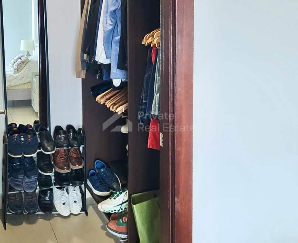 Bright open plan living dining space with floor-to-ceiling windows at PH Oceania Tower Panama