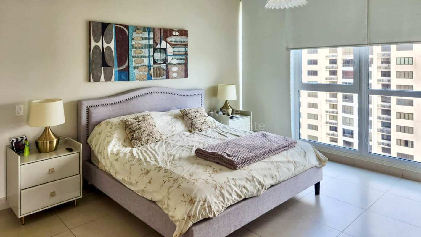 Bright master bedroom with panoramic windows and ocean view at PH Oceania Tower Panama