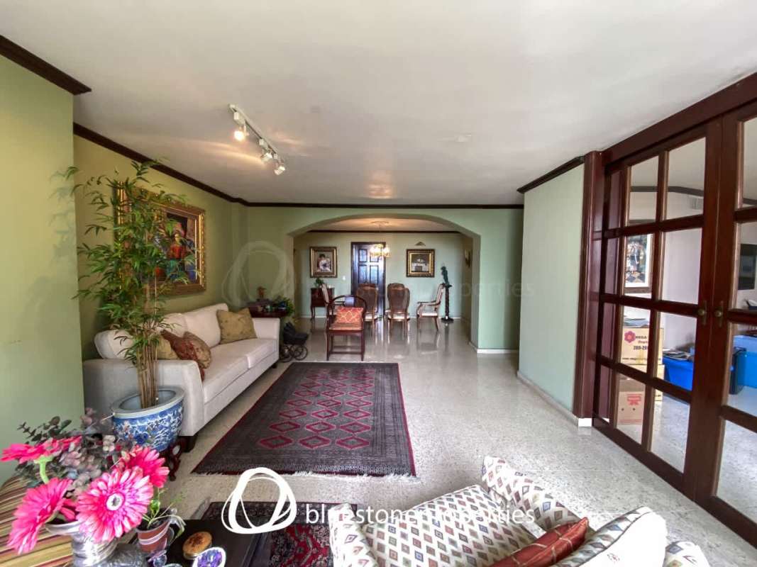 Spacious open plan living and dining space with natural light Marbella Park Panama Condo