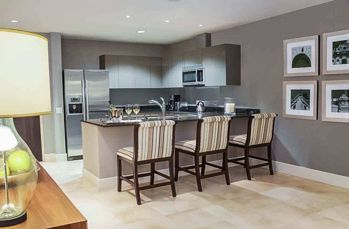 Modern kitchen with island bar, stainless appliances in Bristol Panama City Tower