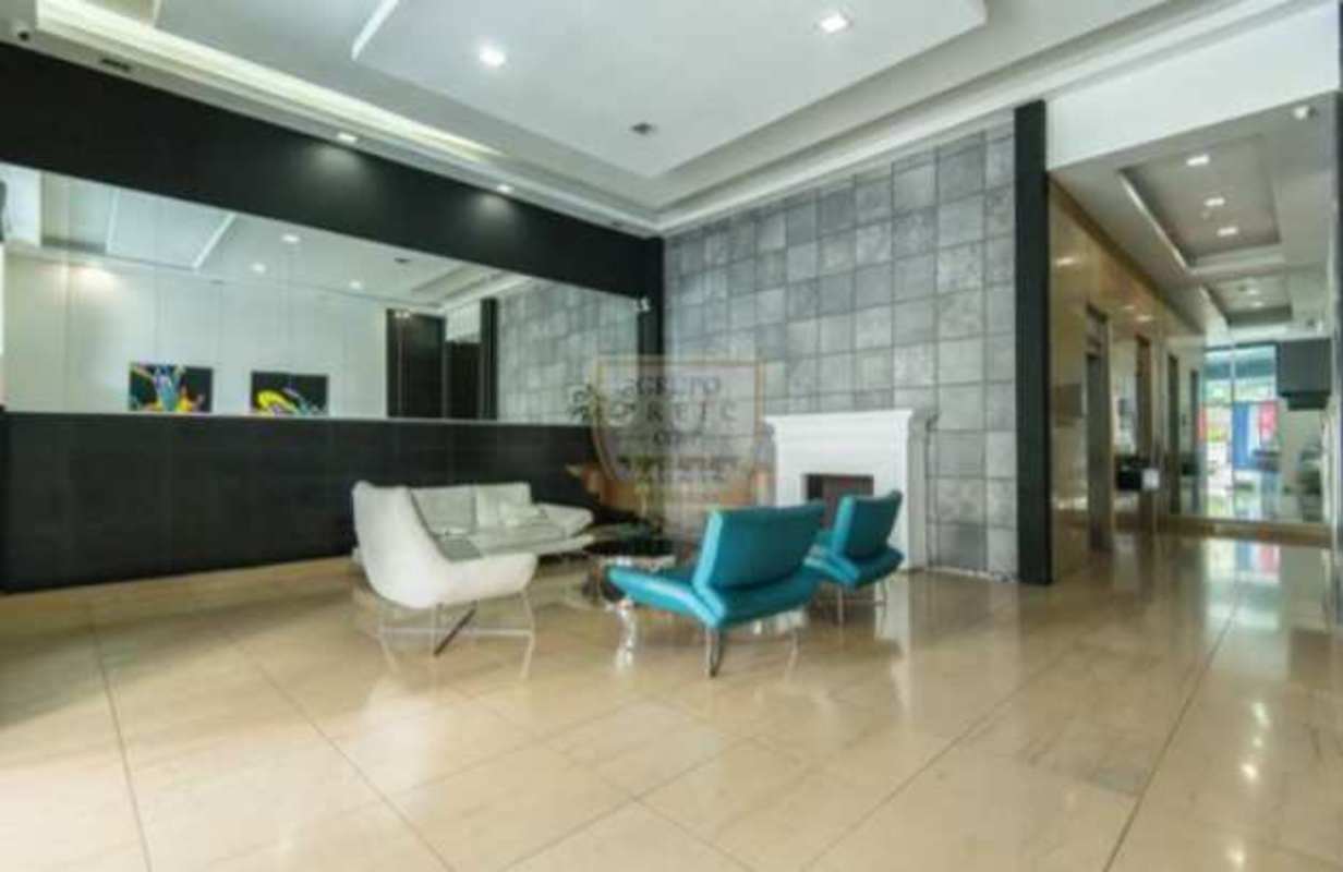 Modern gym with cardio machines, weights, panoramic windows Quartier 74 Panama