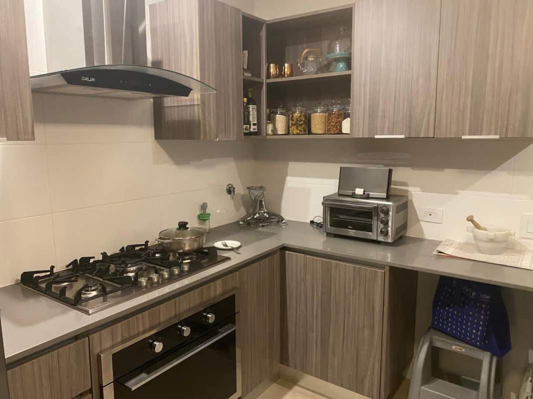 Fully equipped kitchen granite countertops wooden cabinets Golf Garden duplex Panama