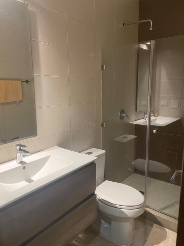 Modern bathroom with glass shower tile finishes Golf Garden Brisas del Golf