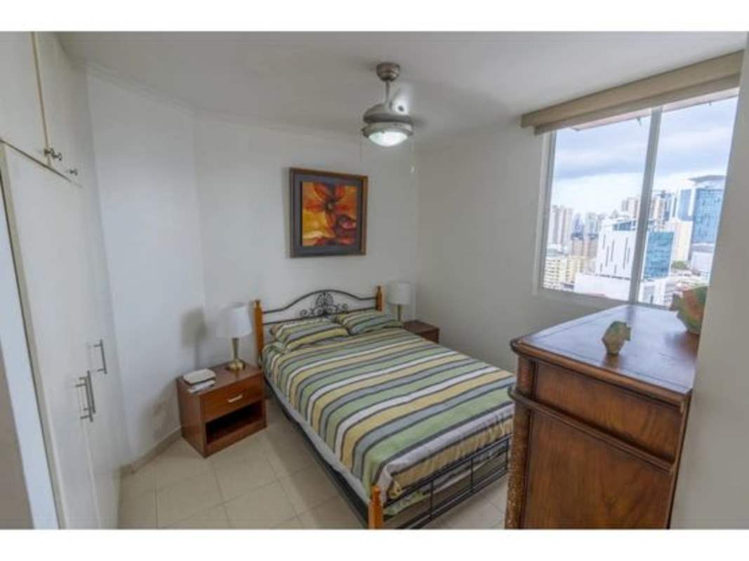 Master bedroom with large windows, AC, built-in closet, city view in PH El Santorini El Cangrejo Panama