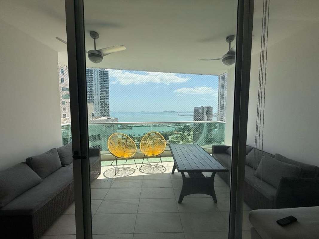 Modern bathroom with vessel sink, glass shower, marble details in PH Costanera Panama City