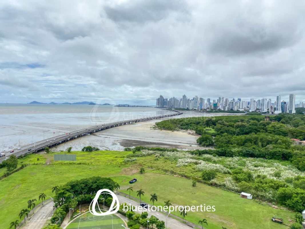 Master bedroom floor-to-ceiling windows with ocean view at PH Costa del Mar Costa del Este Panama