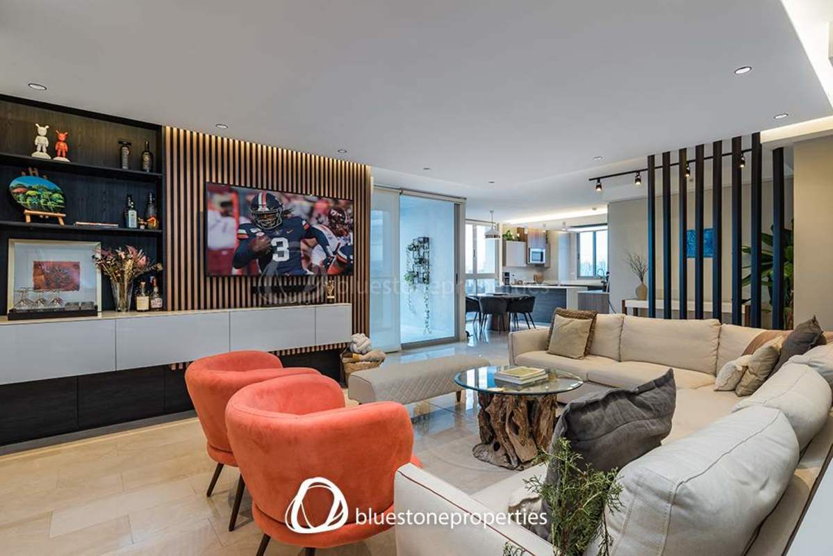 Bedroom with panoramic ocean vista, large window, and neutral decor at PH Coco del Mar