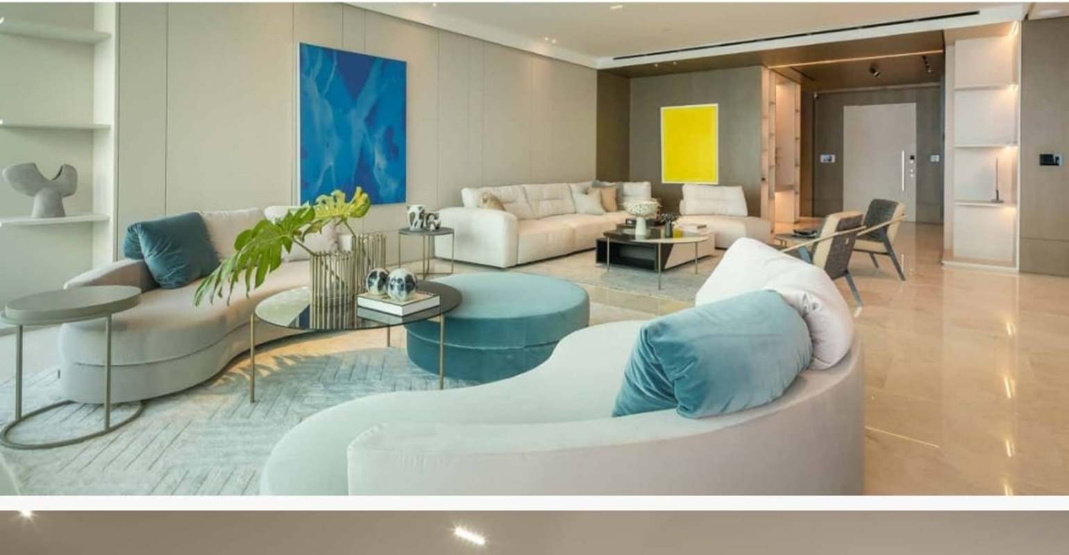 Modern living room space with city skyline and water views Pacific Point Tower 400