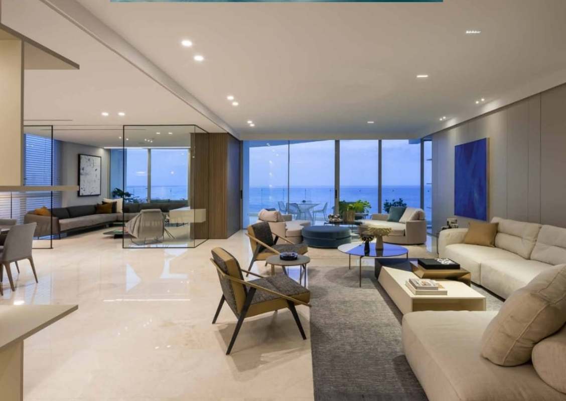 Expansive formal dining space with marble floors and ocean view in Pacific Point Tower 400 Panama City