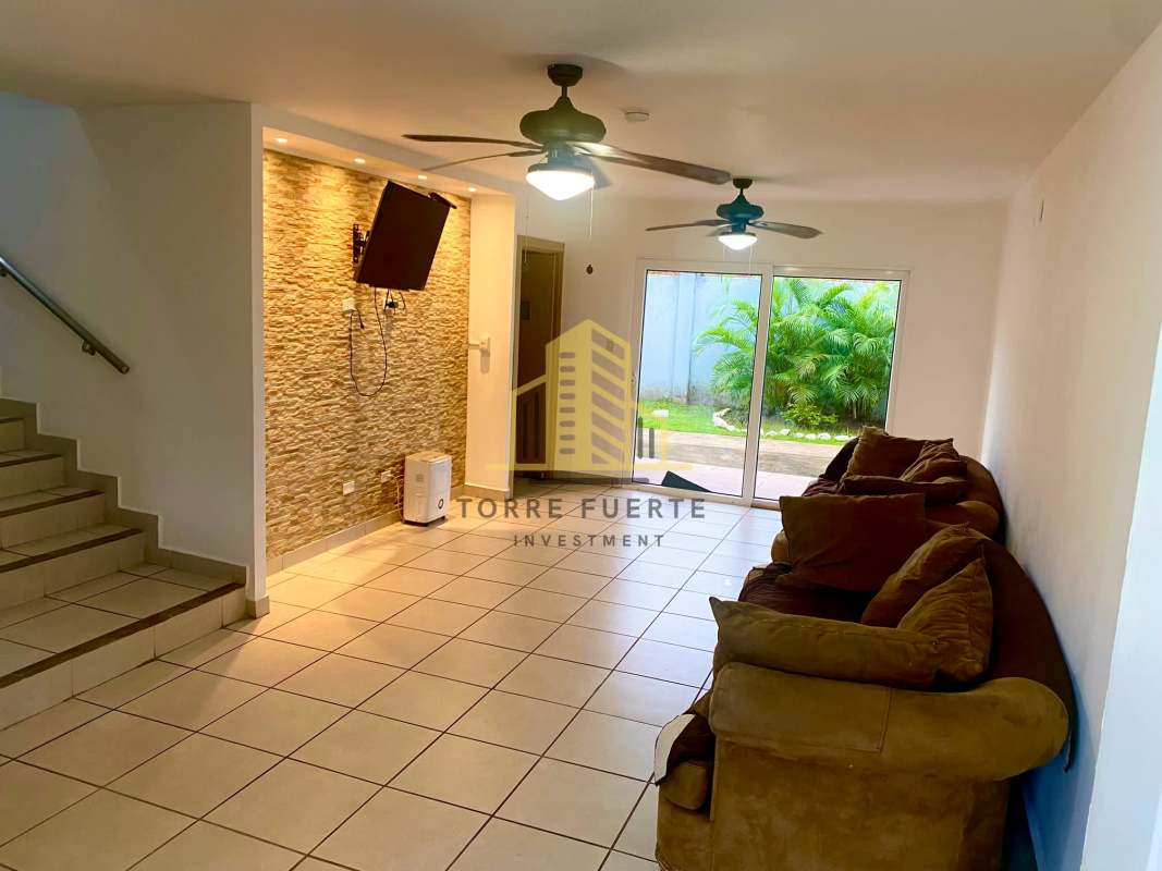 Kitchen with ceramic flooring, refrigerator, gas stove, ceiling fan in Paseo del Norte house Panama