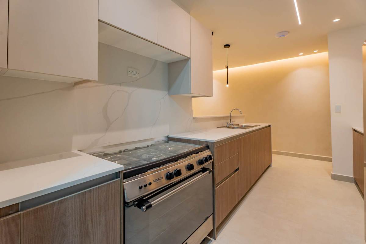 Modern bathroom with glass shower enclosure in Condado Gardens Panama City